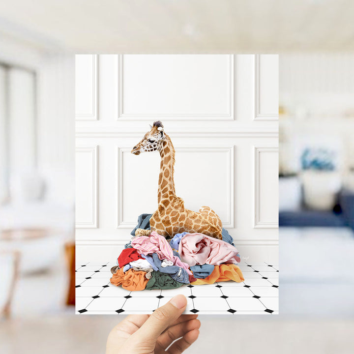 Baby Giraffe in Clothes Pile - Classic White Floor