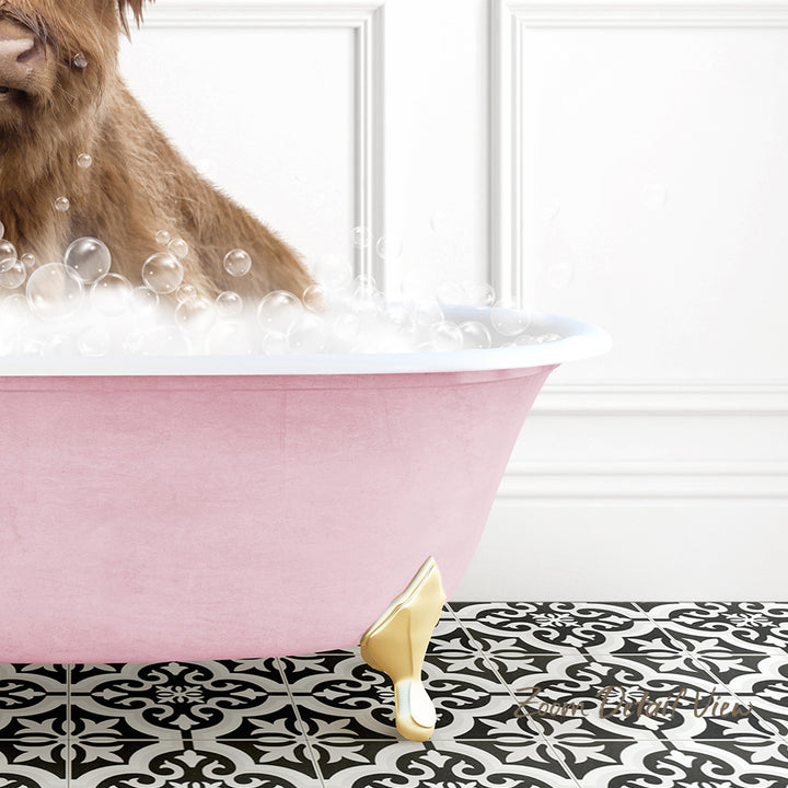 A brown dog is sitting in a pink bathtub filled with bubbles, with a black and white patterned floor in the foreground.