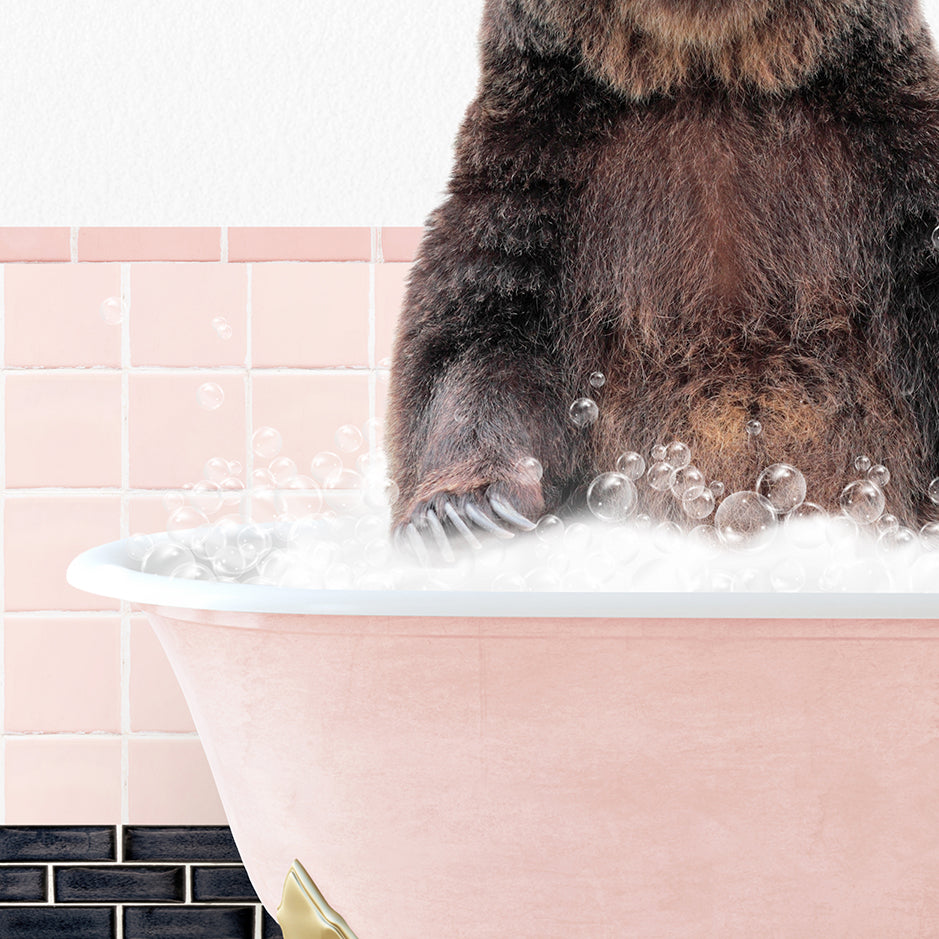 a brown bear sitting in a bathtub filled with bubbles