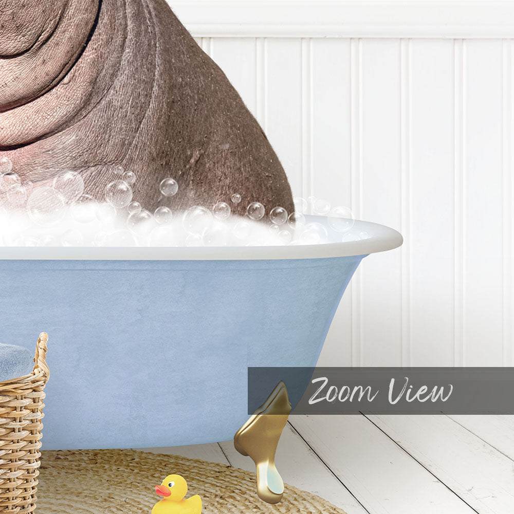A close-up of a bathtub filled with bubbles, with a rubber duck sitting on the edge of the tub.