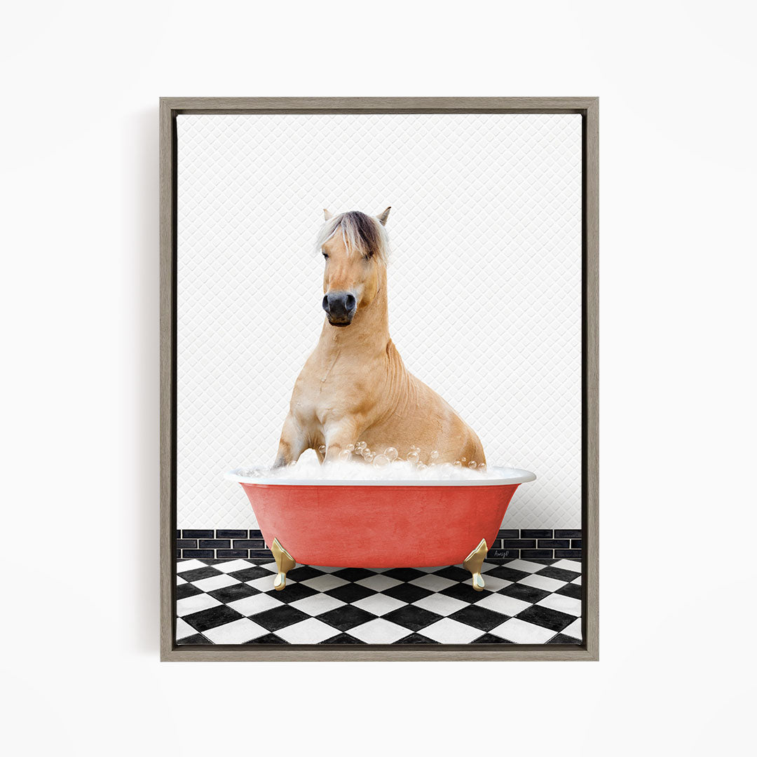 A light brown horse is sitting in a red bathtub filled with water, surrounded by a black and white checkered floor.