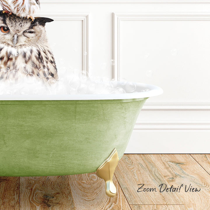 A large owl sitting in a green bathtub filled with bubbles, with a wooden floor and white walls in the background.
