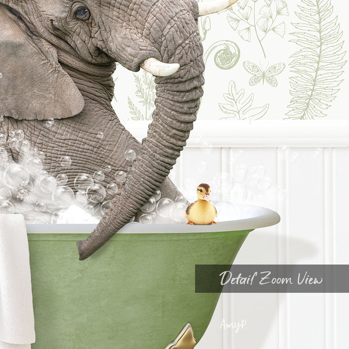 An elephant is taking a bath in a green tub, with a small yellow duck sitting on the edge of the tub.