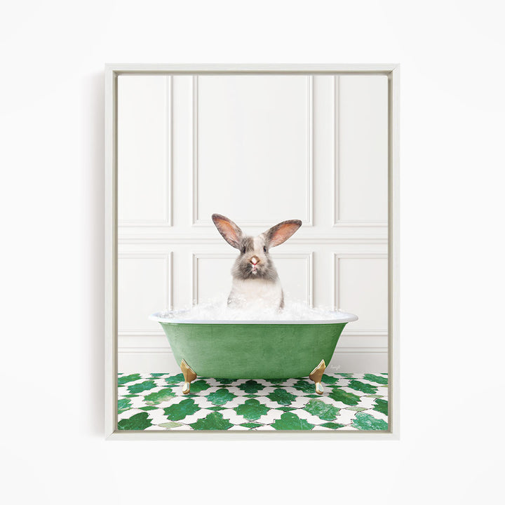 A white rabbit sitting in a green bathtub filled with water, with a patterned green and white floor in the background.