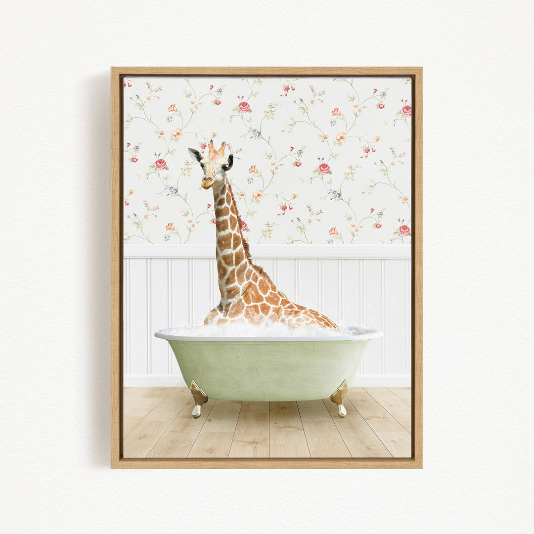 A giraffe sitting in a green bathtub filled with water, surrounded by a floral wallpaper.