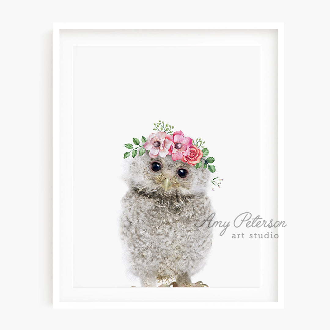 a picture of an owl wearing a flower crown