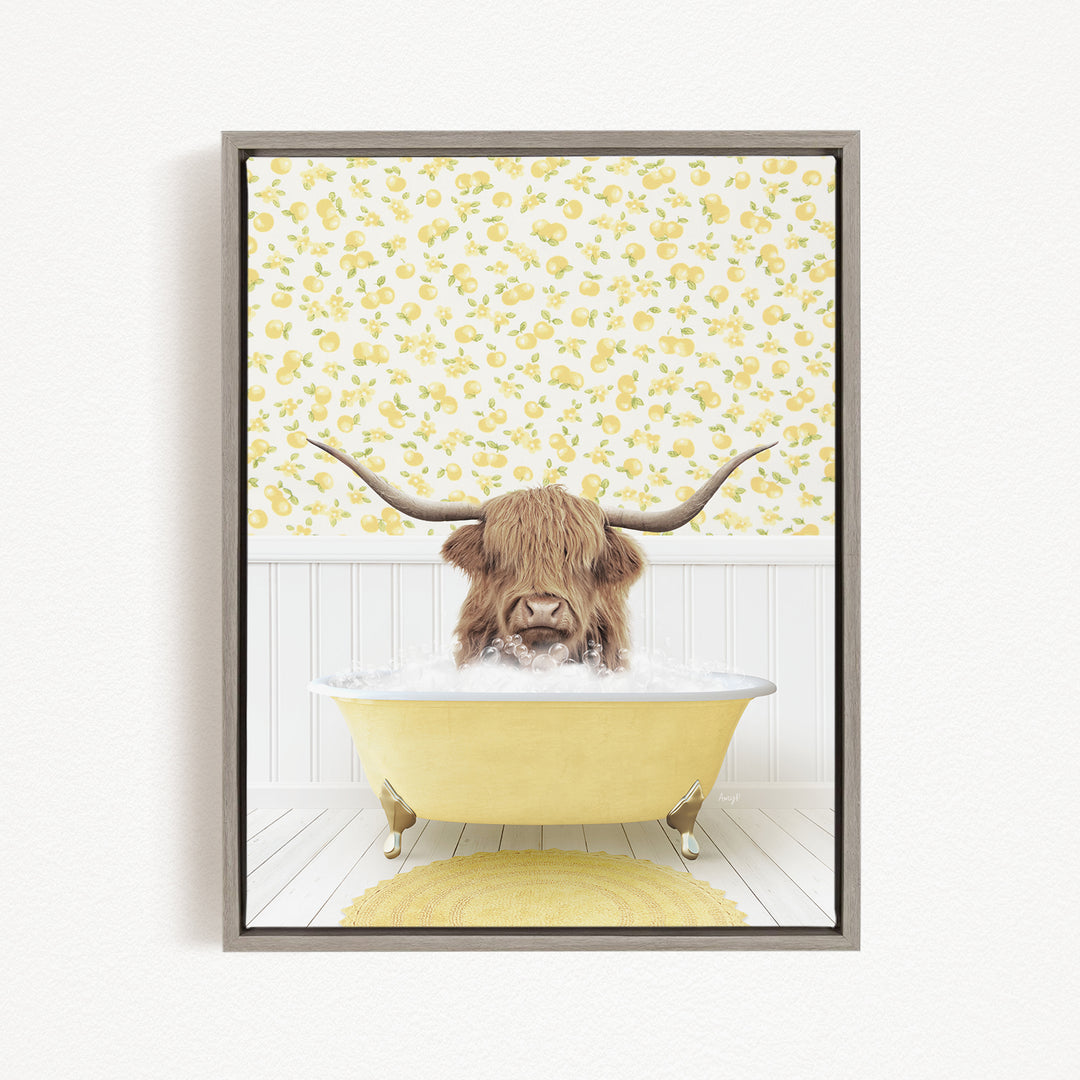 A brown cow with long horns is sitting in a yellow bathtub filled with water, surrounded by a yellow floral wallpaper.