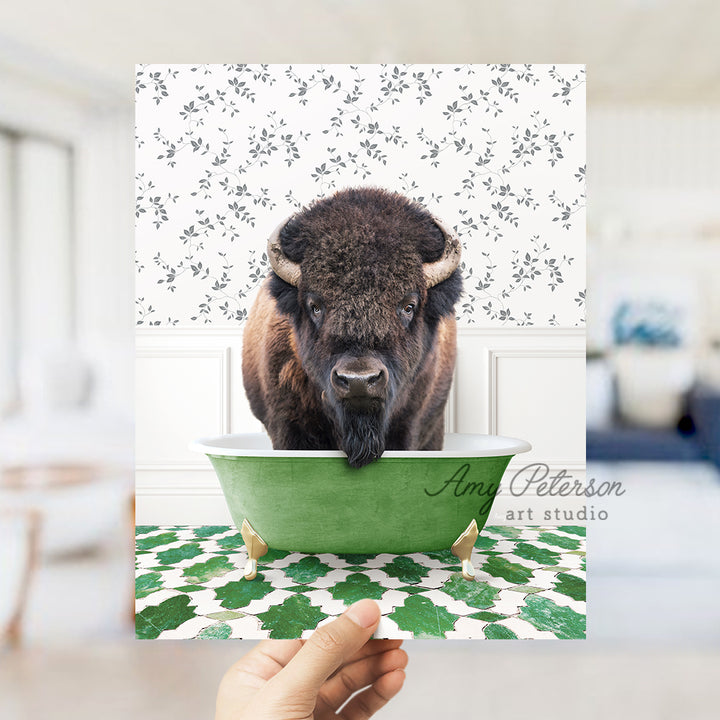 a bison is standing in a green bathtub