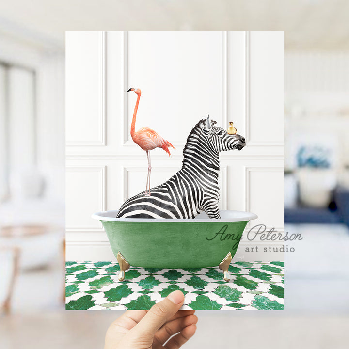 a hand holding a card with a zebra and a flamingo in a bathtub