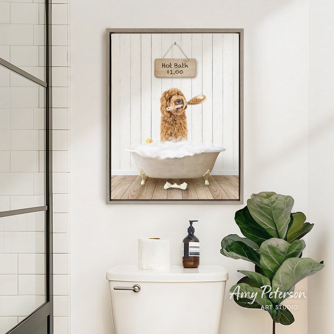 A framed image of a dog sitting in a bathtub, with a sign above it that says "Hot Bath is Fun". The image also includes a toilet and a potted plant in the bathroom.