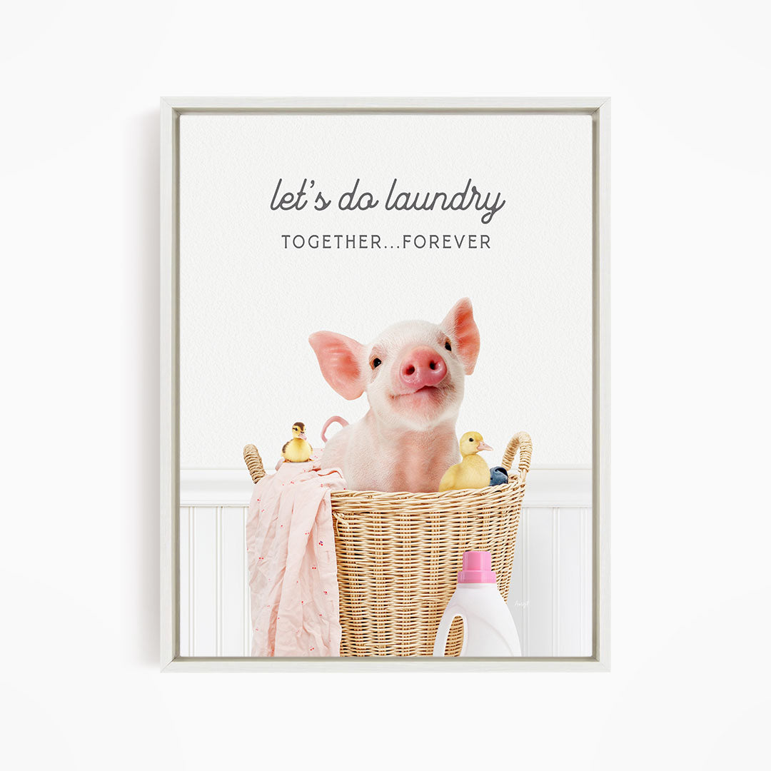 A cute pig sitting in a wicker basket filled with toys, with the text "let's do laundry together forever" displayed above the image.