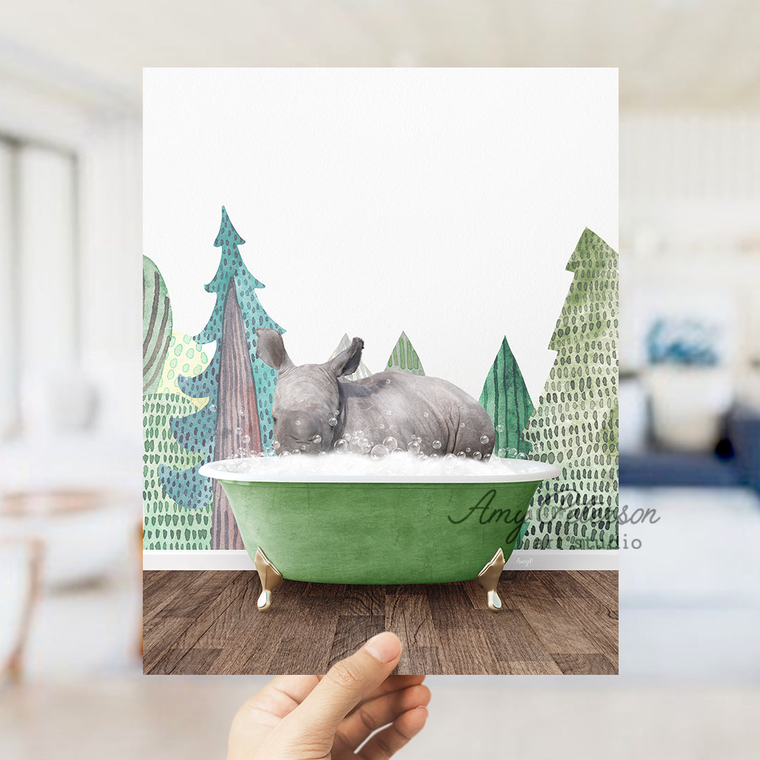 a person holding up a card with a picture of a rhino in a bathtub