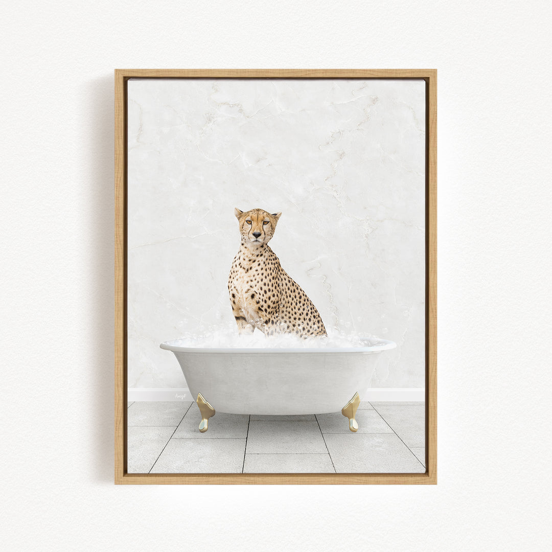 A cheetah sitting in a white bathtub filled with bubbles.