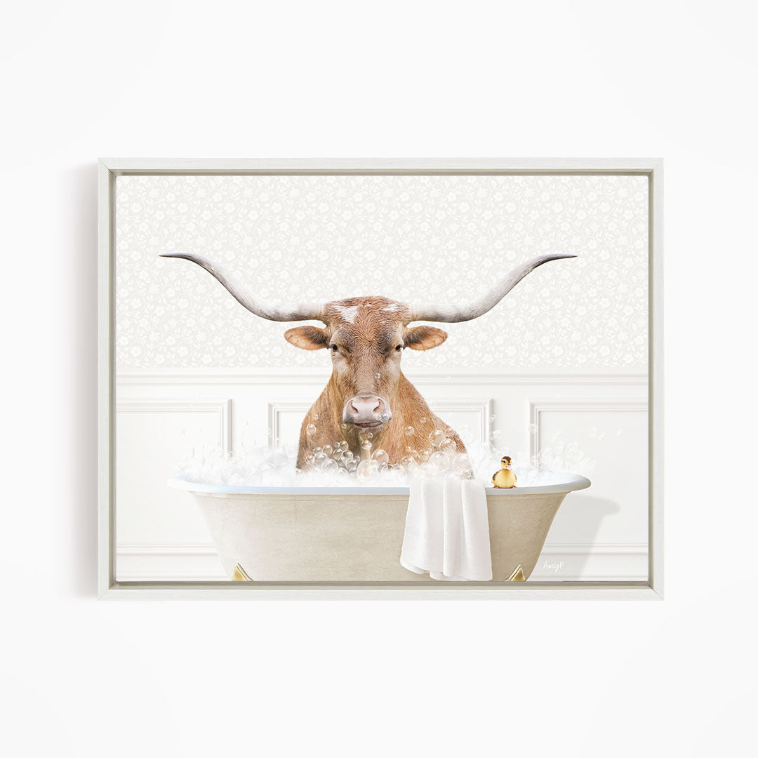 A bull with large horns is sitting in a bathtub filled with water, surrounded by bubbles.