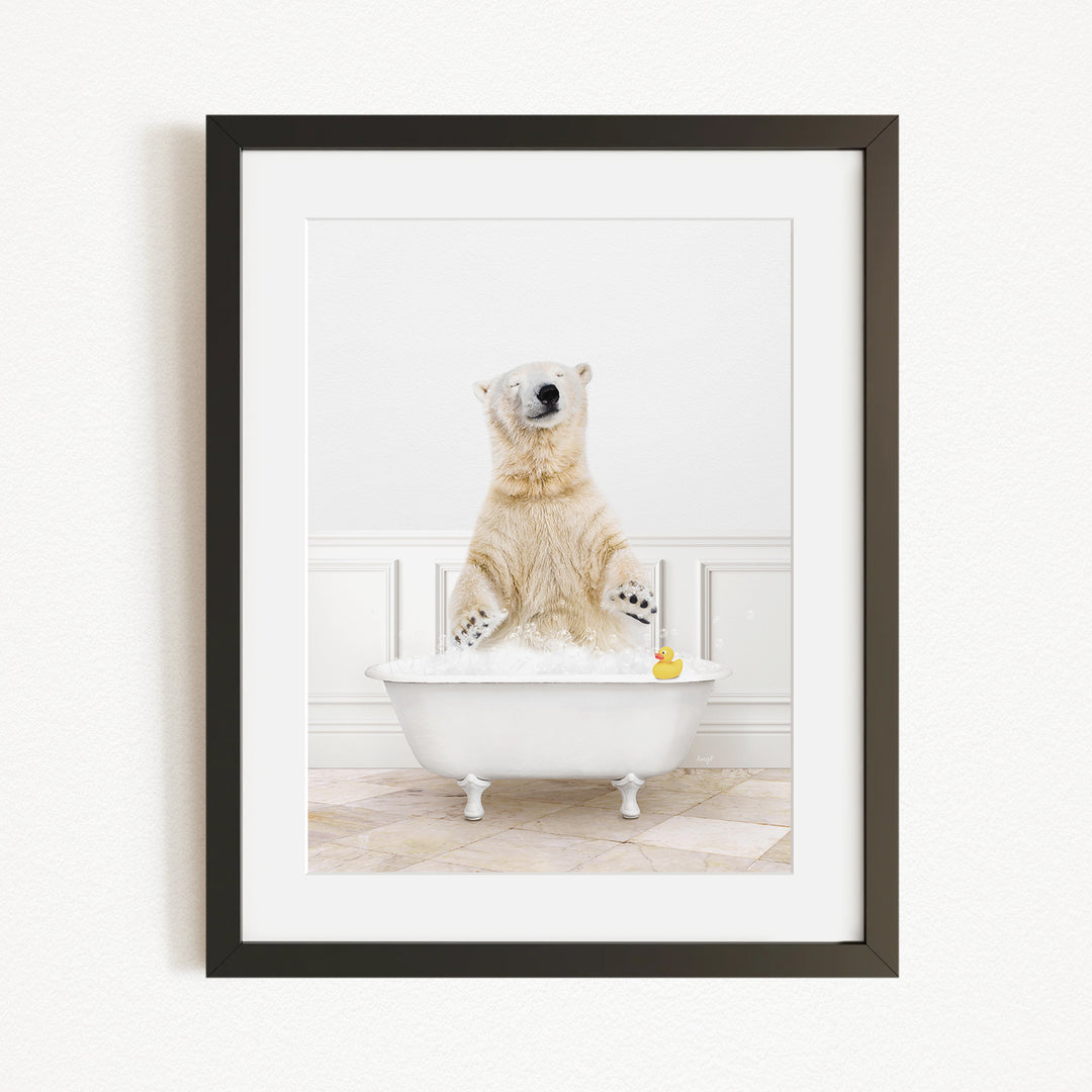 A polar bear is sitting in a bathtub filled with water, surrounded by a yellow rubber duck.