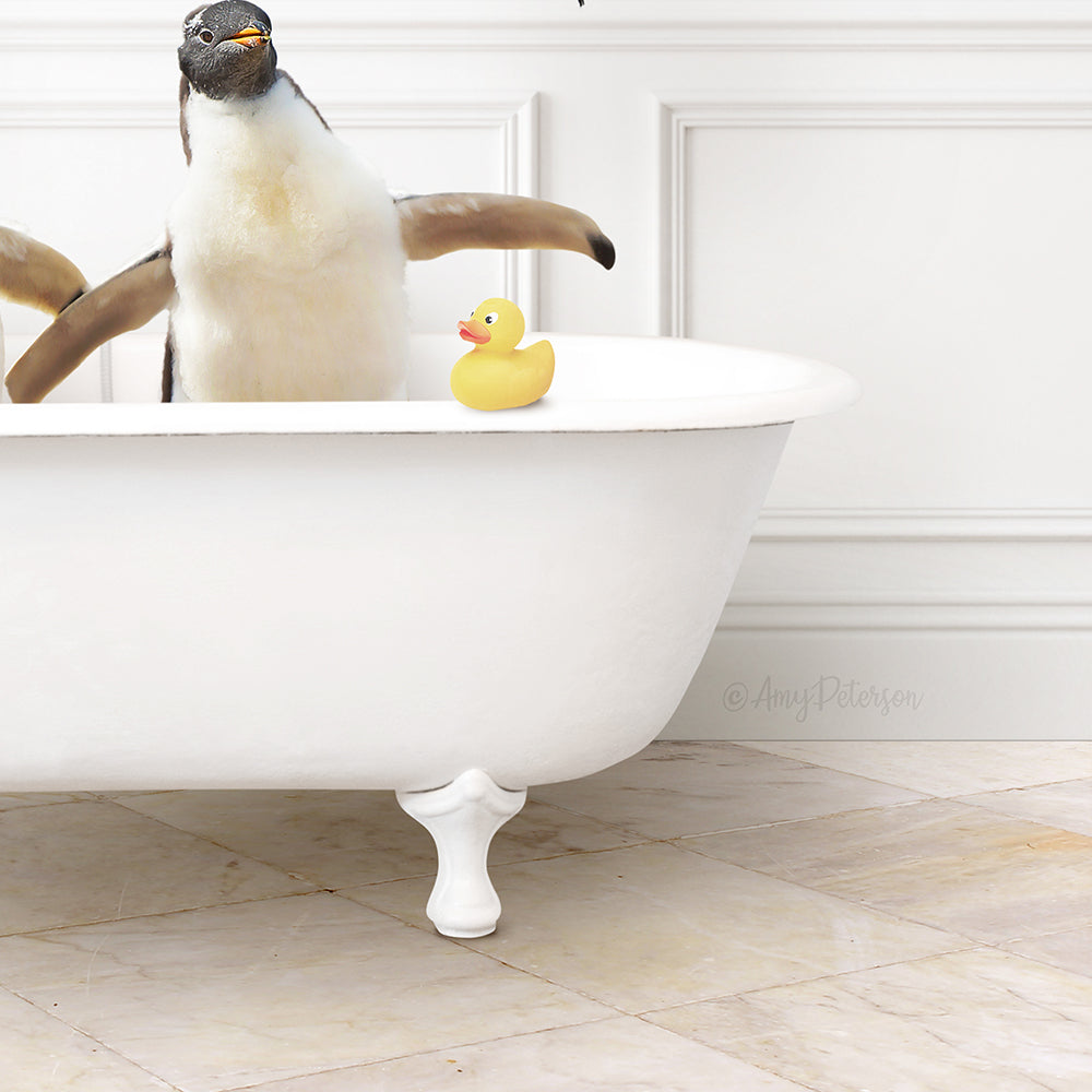 A penguin standing in a white bathtub, with a yellow rubber duck floating on the water.