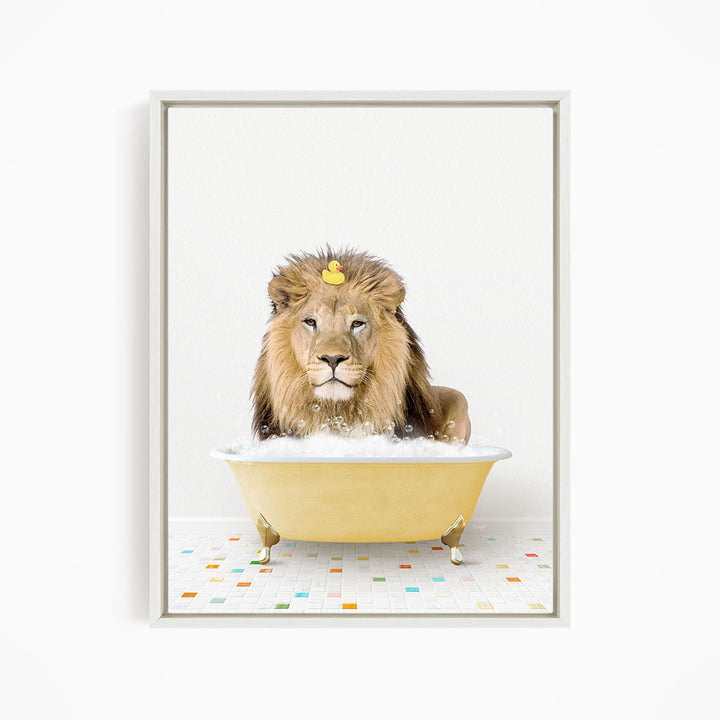 A lion is sitting in a yellow bathtub filled with bubbles, with a rubber duck floating on its head.