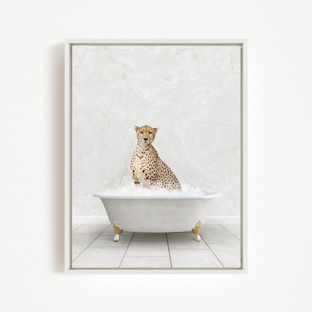 A cheetah sitting in a white bathtub filled with bubbles, creating a whimsical and playful scene.