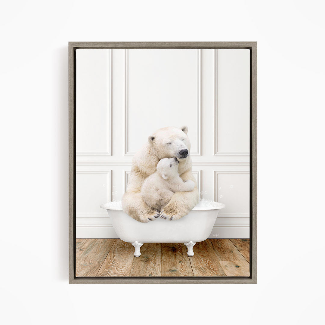 A mother polar bear and her cub cuddling in a white bathtub against a white wall.