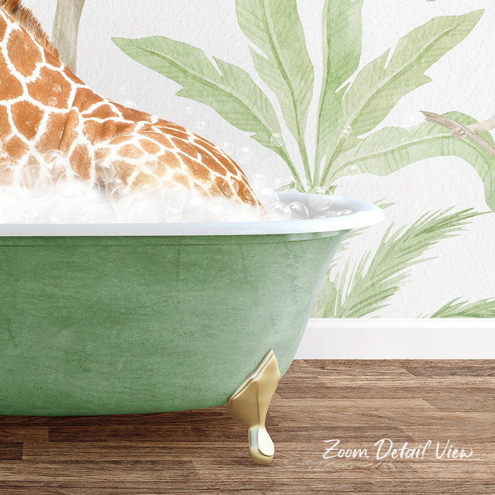 A giraffe is sitting in a green bathtub filled with water, surrounded by a tropical plant wall with palm leaves.