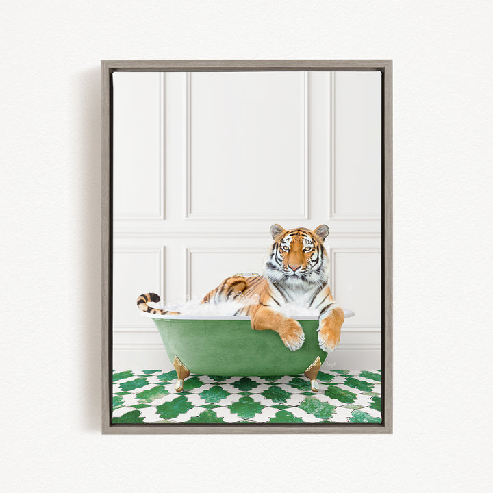 A tiger is sitting in a green bathtub filled with water, surrounded by a green and white patterned rug.