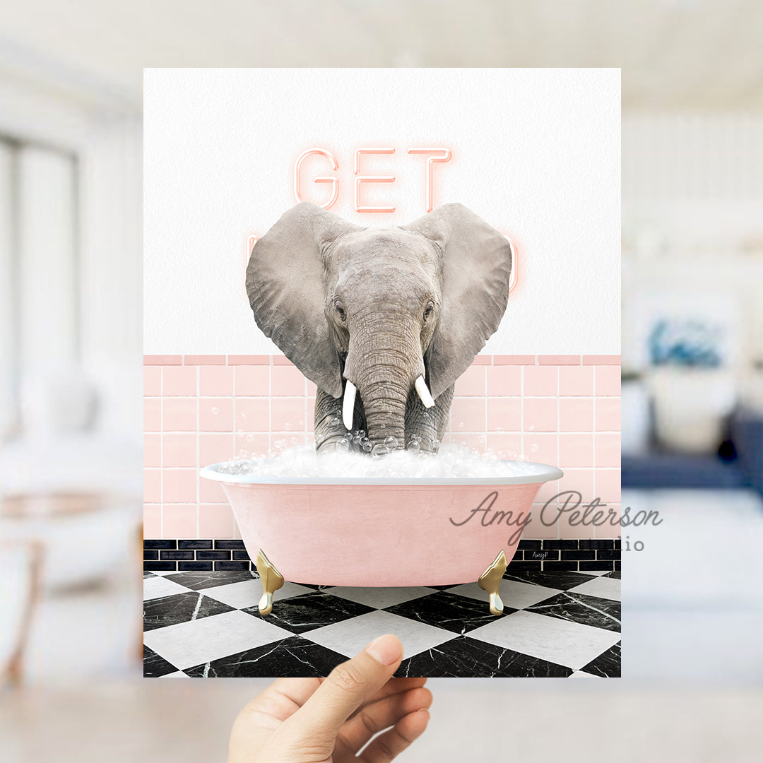 a person holding up a card with an elephant in a bathtub