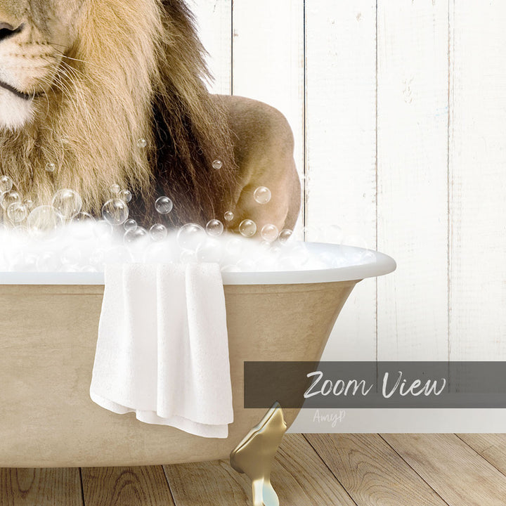 A lion is sitting in a bathtub filled with bubbles, with a towel draped over the side of the tub.
