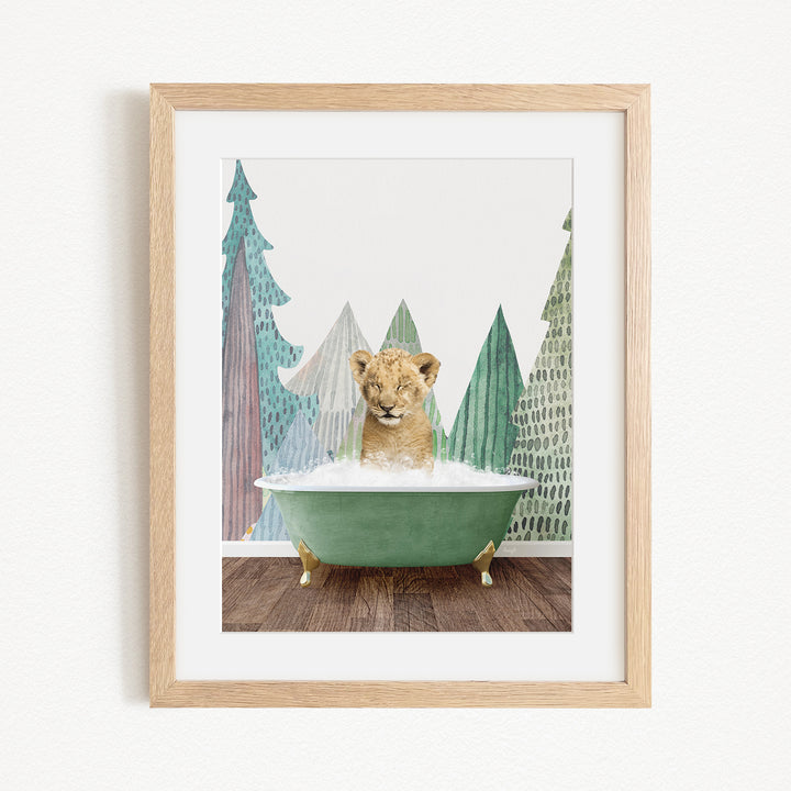 A young lion cub sitting in a green bathtub, surrounded by stylized trees in the background.