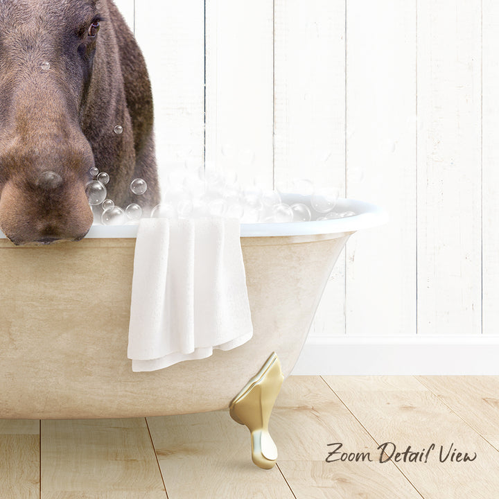 A dog is sitting in a bathtub filled with bubbles, with a towel and a gold faucet visible.