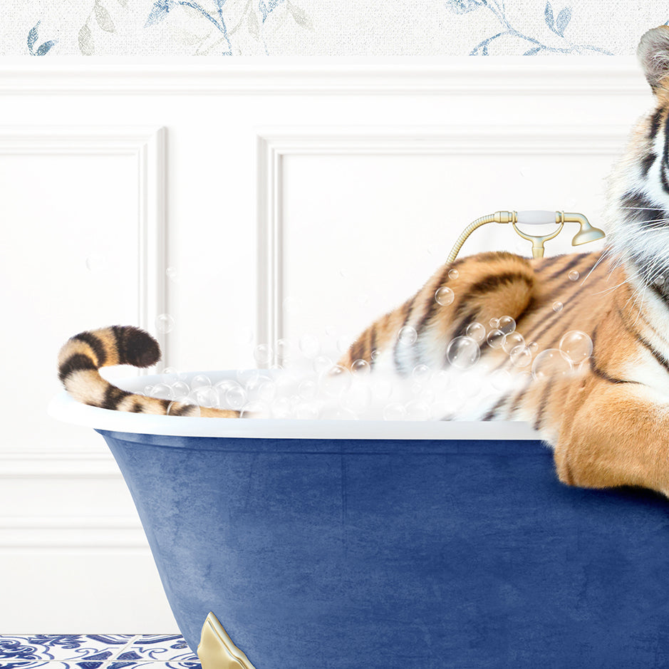 a stuffed tiger sitting in a bath tub