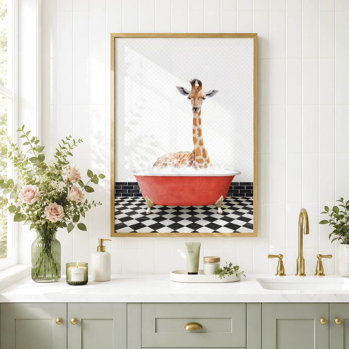 a giraffe sitting in a red bathtub, surrounded by a black and white checkered floor and a white countertop with various bathroom accessories.