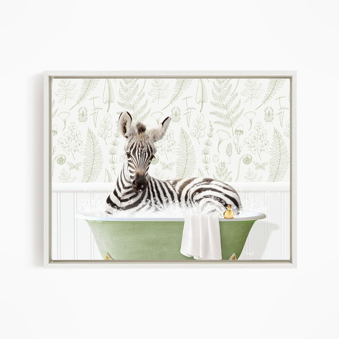 A zebra is sitting in a green bathtub, surrounded by a patterned wallpaper.