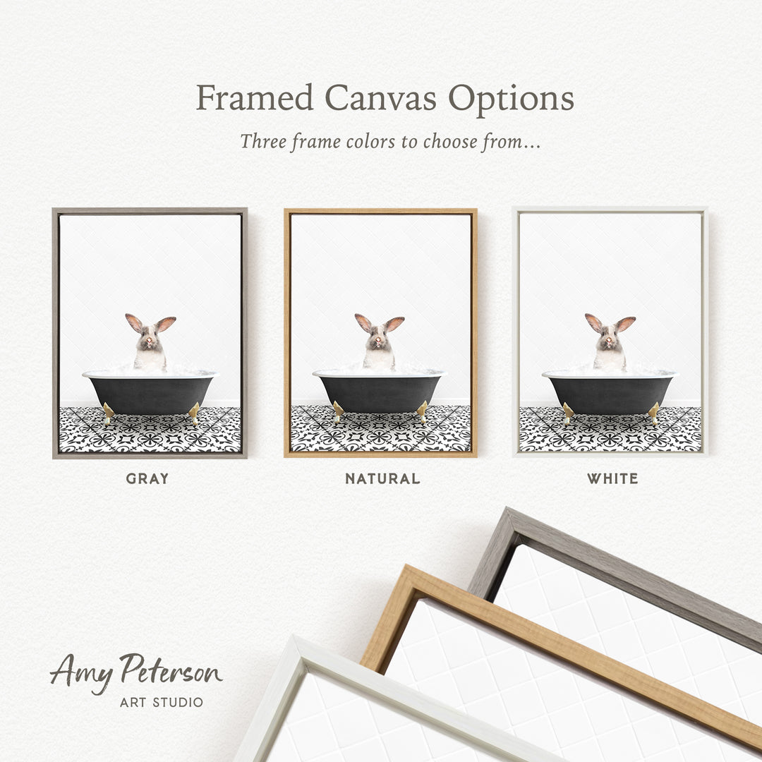 The image is a framed canvas option showcasing three different frame colors: gray, natural, and white. The canvas features a rabbit sitting in a bathtub, and the frame colors are gray, natural, and white.