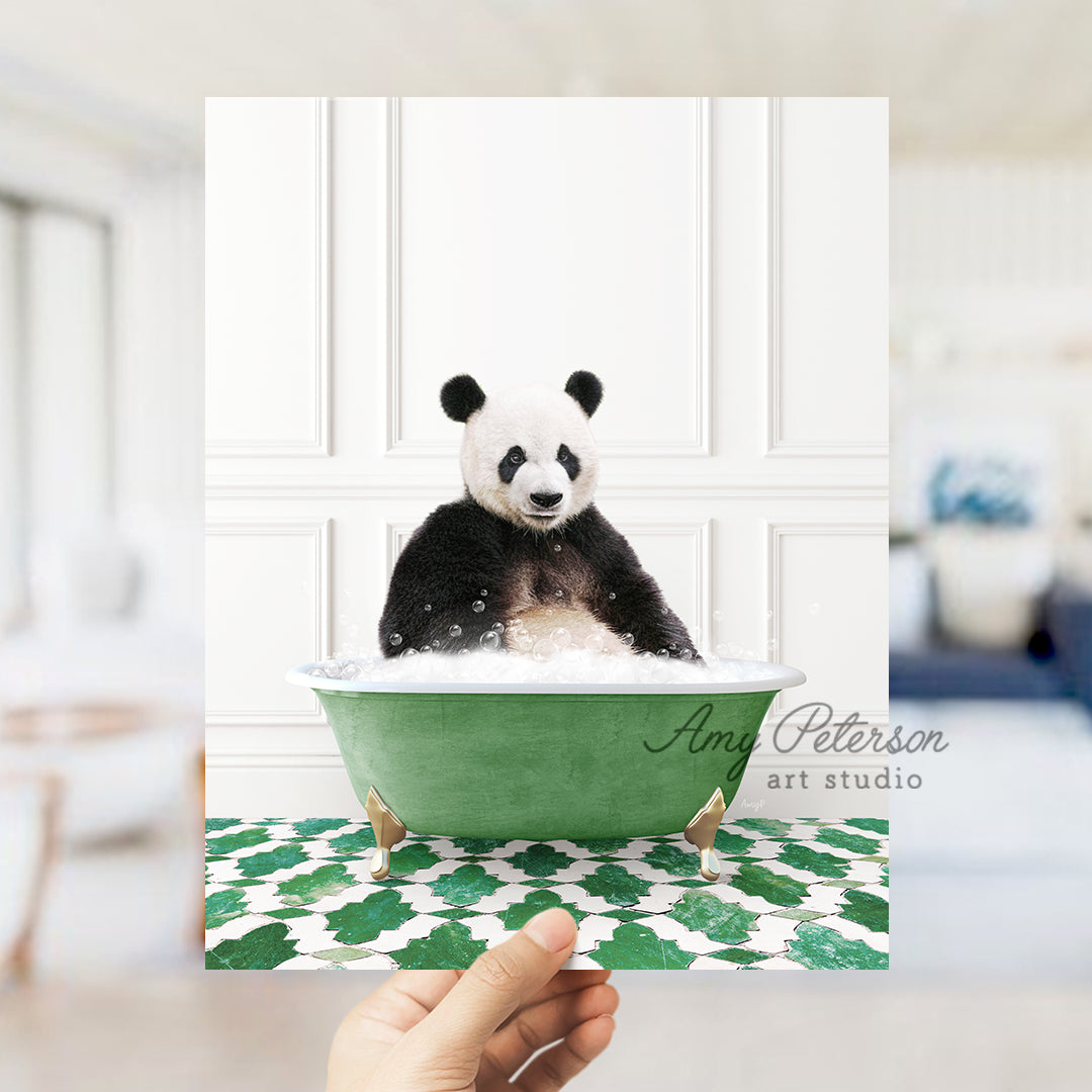 a panda bear sitting in a green bath tub