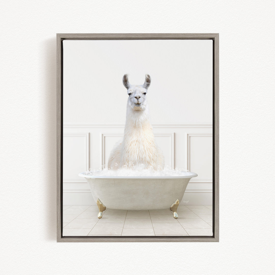 A white llama sitting in a white bathtub filled with bubbles, creating a whimsical and playful scene.