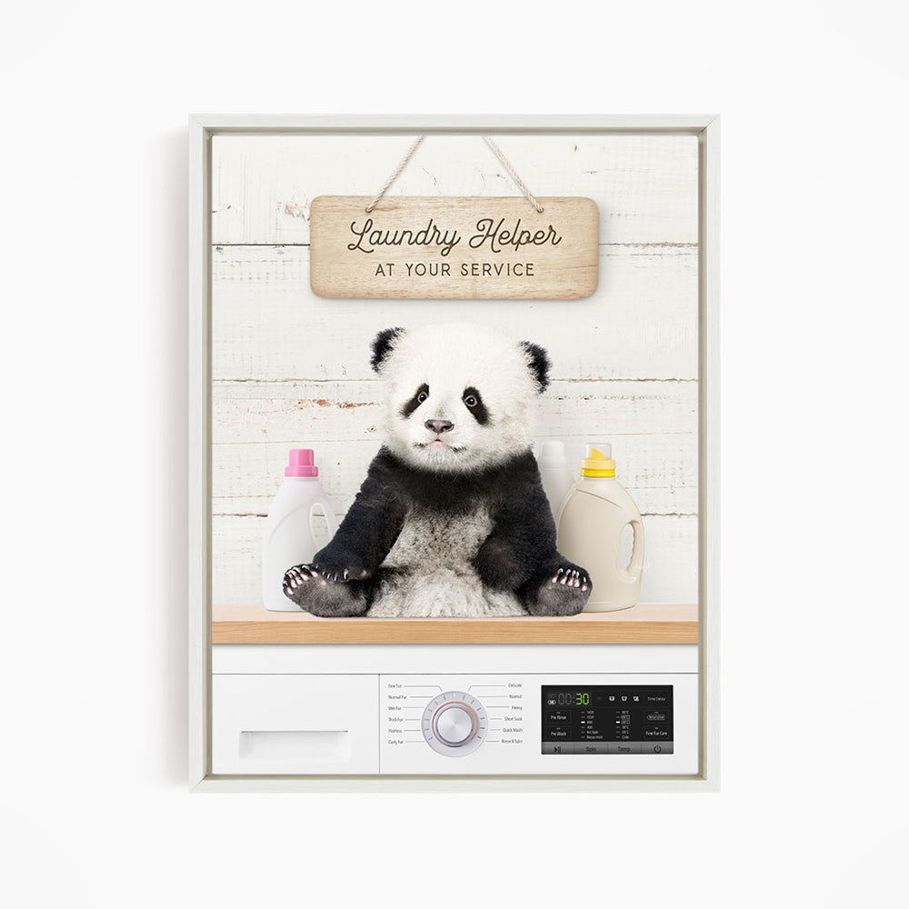 A panda bear sitting on a shelf next to laundry supplies, with a sign that says "Laundry Helper at your service".