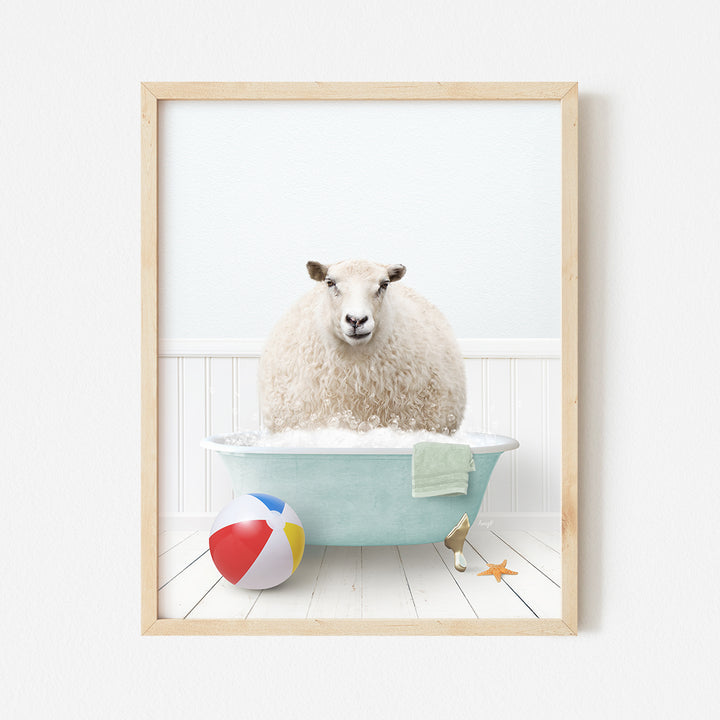 a sheep sitting in a bathtub with a beach ball