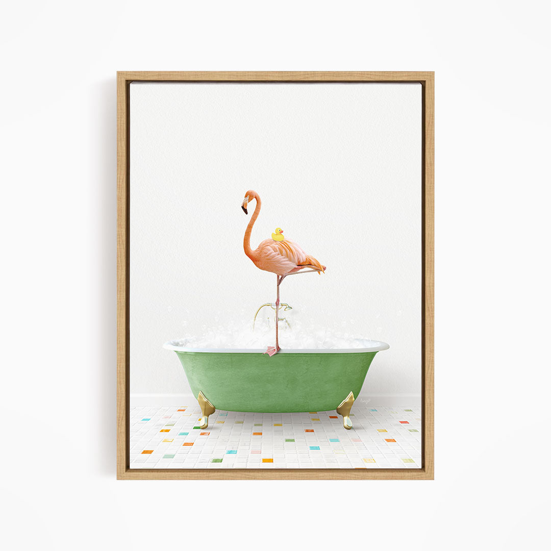 A pink flamingo stands on a green bathtub filled with bubbles, with a yellow duck perched on its back.