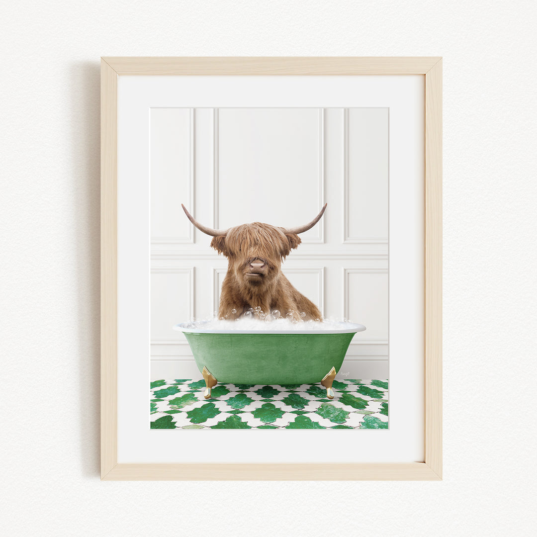 A brown cow with long horns is sitting in a green bathtub filled with water, creating a whimsical and playful scene.
