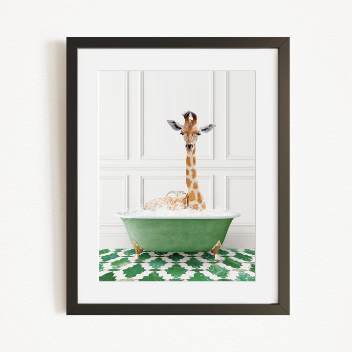 A giraffe is sitting in a green bathtub filled with bubbles, creating a whimsical and playful scene.