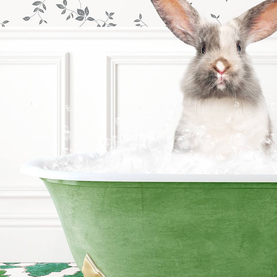 a rabbit is sitting in a bathtub with foam