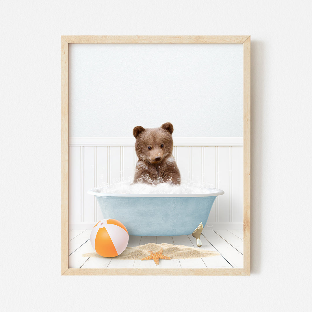 a brown teddy bear sitting in a bath tub