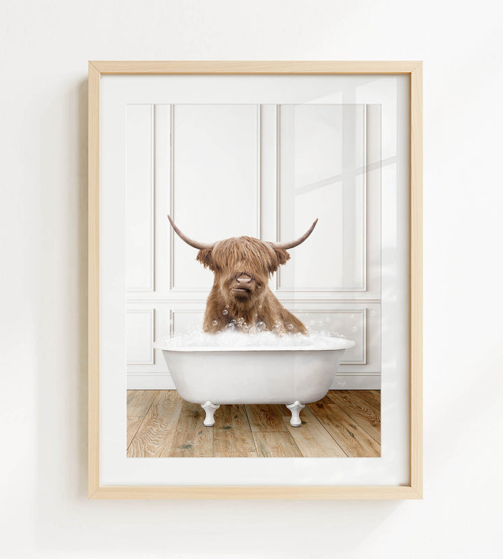 A brown cow with long horns is sitting in a white bathtub filled with bubbles, creating a whimsical and playful scene.