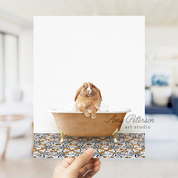 a person holding a card with a picture of a rabbit in a bathtub