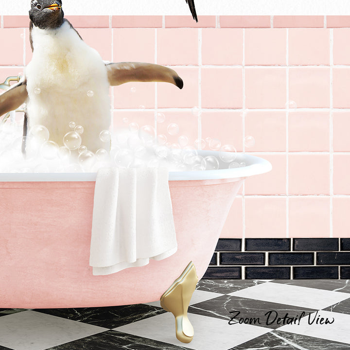 A penguin sitting in a pink bathtub filled with bubbles, with a towel hanging on the side and a pink tile wall in the background.