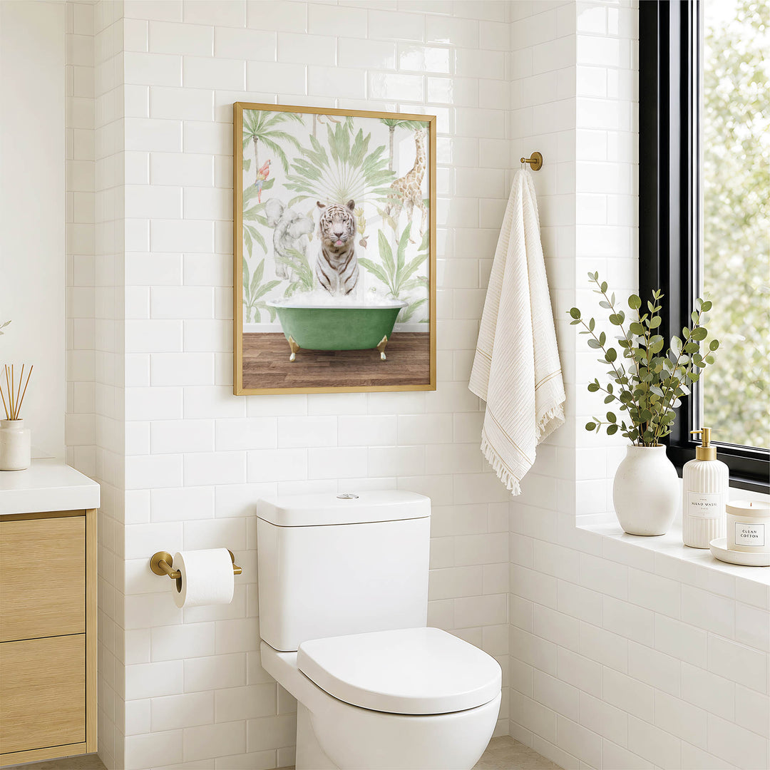 A bathroom with a white toilet, a framed picture of a tiger in a bathtub, and a window with greenery on the sill.
