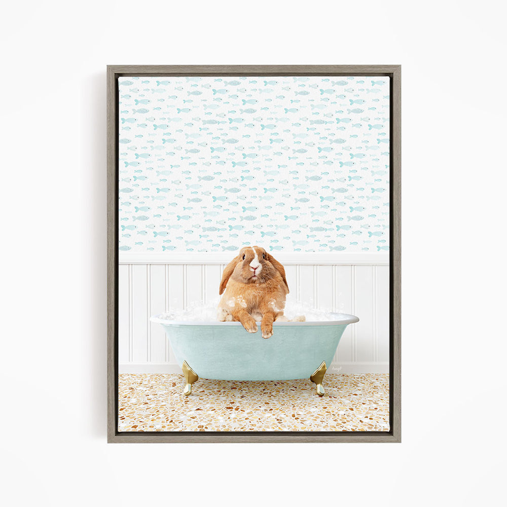 A brown rabbit sitting in a light blue bathtub filled with water, surrounded by a pattern of small fish.