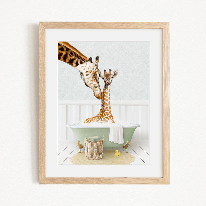 A mother giraffe and her baby giraffe are enjoying a relaxing bath in a green bathtub, surrounded by a basket of toys and a yellow rubber duck.
