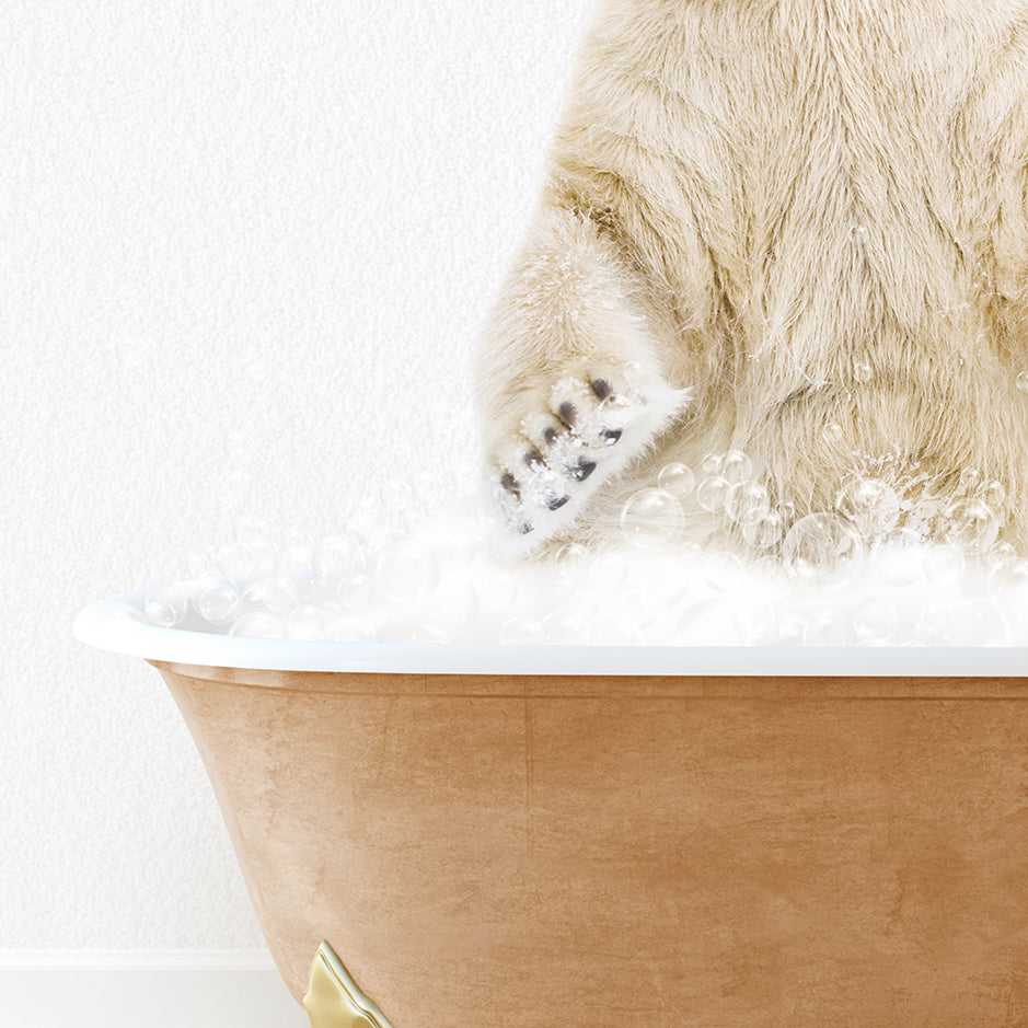 a polar bear sitting in a bathtub full of foam