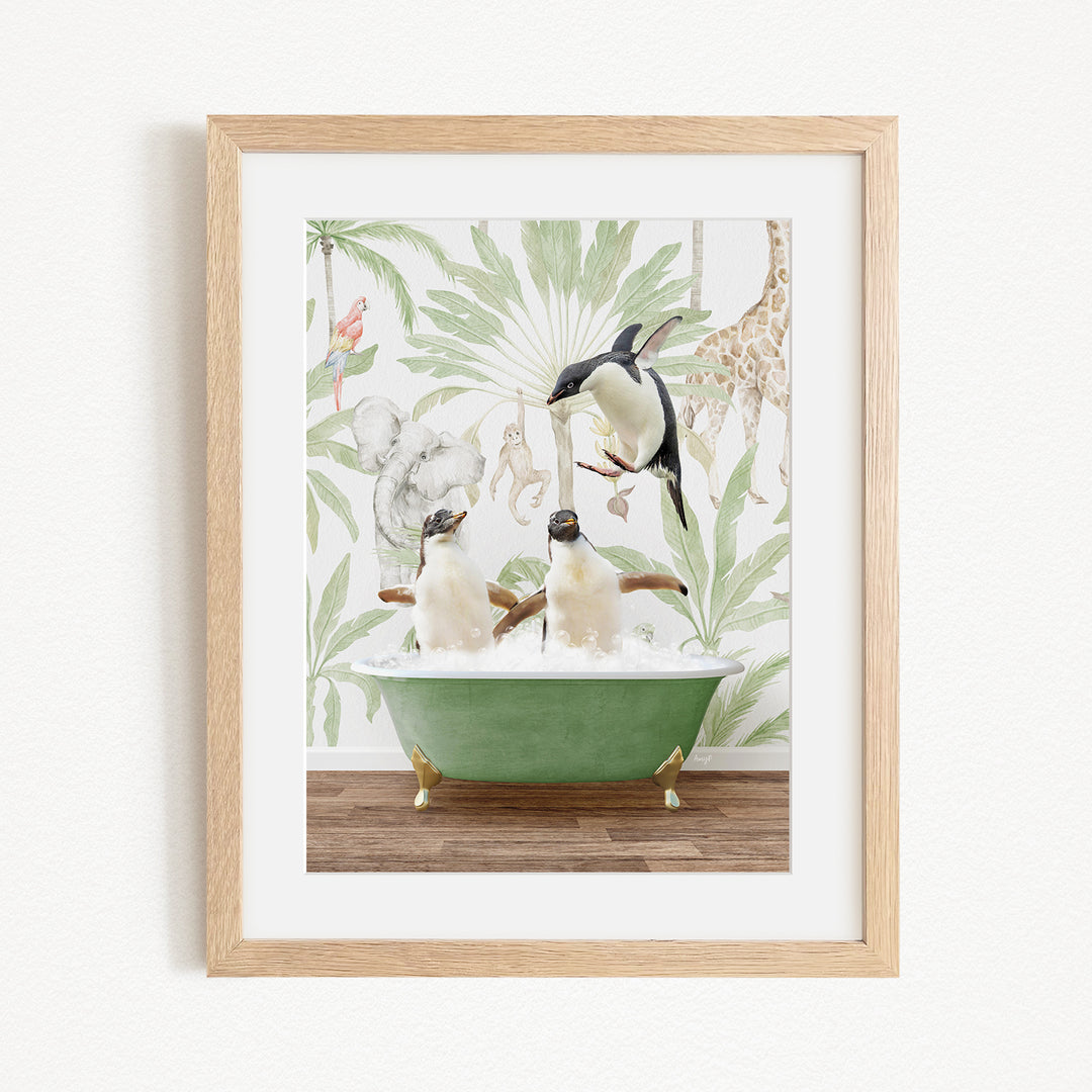A framed image depicting three penguins sitting in a green bathtub, surrounded by a tropical jungle-themed wallpaper.